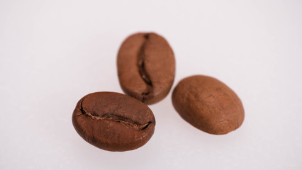 macro photo of three coffee beans