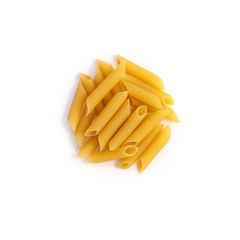 Raw pasta penne rigate isolated over white background