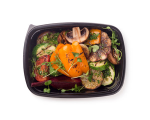 Grilled vegetables in black delivery box for Diet nutrition