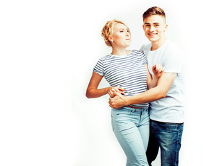 young pretty teenage couple, hipster guy with his girlfriend happy smiling and hugging isolated on...