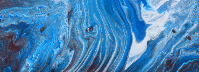 Fotografie des abstrakten marmorierten Effekthintergrundes. Blaue und weiße kreative Farben. Schöne Farbe. Banner