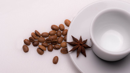 espresso cup coffee beans and anise