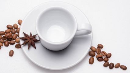 espresso cup coffee beans and anise