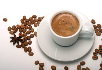 espresso cup coffee beans and anise