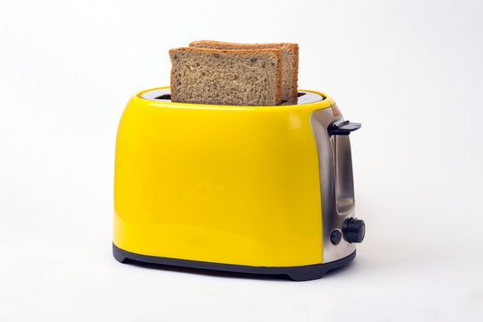 yellow toaster on a white background