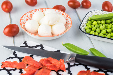 Bowl of salad with smocked salmon.