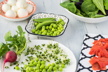 Bowl of salad with smocked salmon.