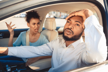 Missed road. Afro couple arguing during their journey