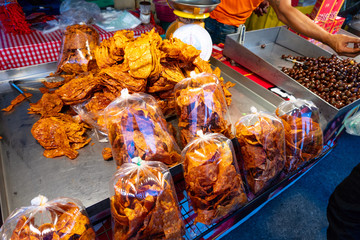 Street Thai food sold in Phantip market stall in Koh Pha Ngan, Thailand