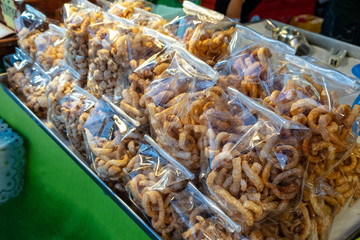 Street Thai food sold in Phantip market stall in Koh Pha Ngan, Thailand