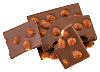 chocolate pieces with nuts isolated on white background