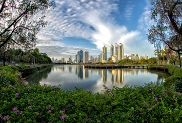 Fototapeta na wymiar Benchakitti park , green lung of Bangkok , with reflections , Thailand