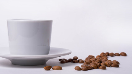 espresso cup and coffee beans