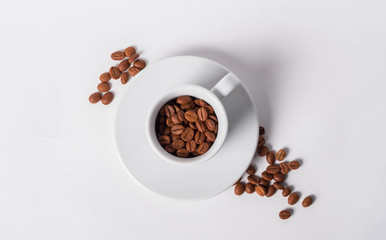espresso cup and coffee beans