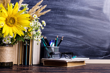 Teacher's day holiday greeting icon. Education knowledge concept. Wooden chalk board frame and vase...