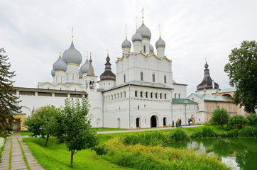 Fototapeta na wymiar Rostov the Great, Yaroslavl region, Russia - July 24, 2019: Gate Church of the Resurrection and the Assumption Cathedral in the Rostov Kremlin. The Golden Ring of Russia 