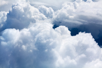 Naklejka na ściany i meble White cumulus clouds on blue sky background close up, overcast skies backdrop, fluffy cloud texture, beautiful sunny cloudscape heaven view, ozone layer illustration, scenic cloudy weather, copy space