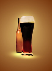 A glass full of dark beer and an empty bottle behind. Artistic processing. Brownish backlit background.