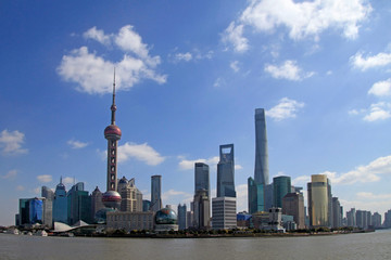 Fototapeta premium The famous skyline of Shanghai, China, on a sunny day