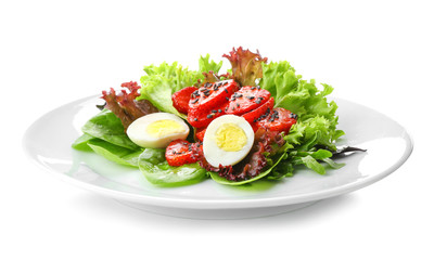 Plate with fresh tasty salad on white background