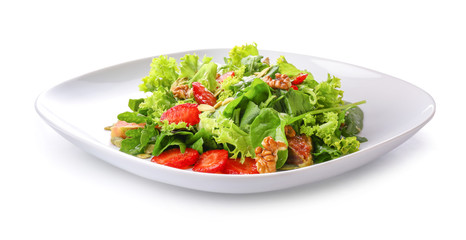Plate with fresh tasty salad on white background