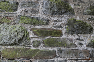 Closeup of vintage stone wall of public park.