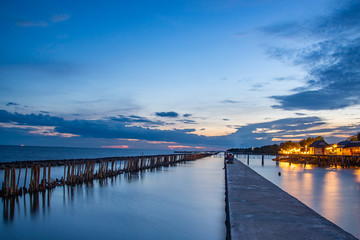 Beautiful of The walkway bridge in evening at Bang Khun Thian sea view, Bang Khun Thian, Bangkok.
