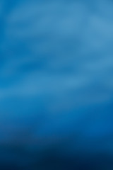 Sun seen from under the water. Abstract image - out of focus.