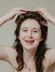 Fototapeta premium Girl and curlers