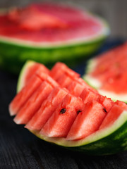 Sliced delicious ripe watermelon on the table close-up
