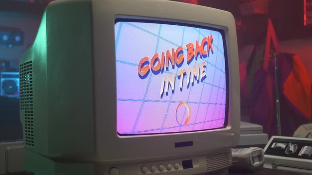 GOING BACK IN TIME title on Old Computer - TV Screen