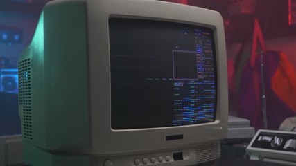 hacking screen with coding on a retro old computer monitor or TV from the 90s 80s - Powered by Adobe
