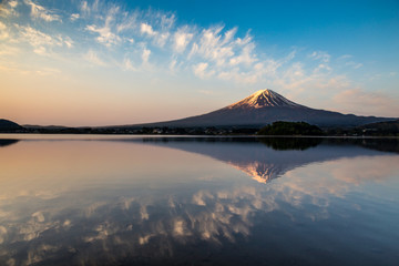 Reflections of Mount Fuji in Kawaguchiko Lake at sunrise