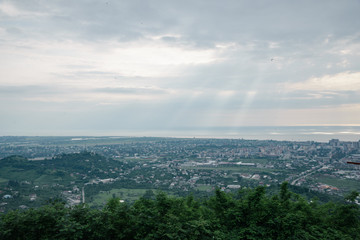 view of the tourist city of Batui from the height of the observation deck in cloudy weather with clouds in the sky.