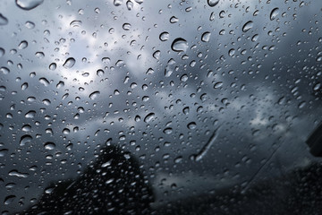View through the windshield on a rainy night.