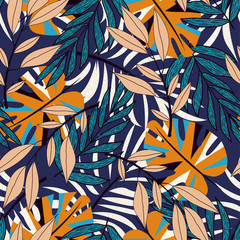 Trend seamless pattern with colorful tropical leaves and plants on a lilac background. Vector design. Jungle print. Floral background. Printing and textiles. Exotic tropics. Summer design.