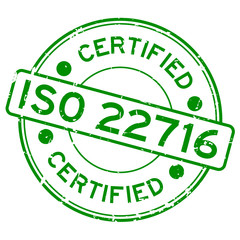 Grunge green ISO 22716 certified word round rubber seal stamp on white background