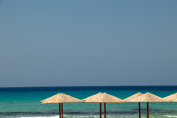 sun umbrellas on Milos island