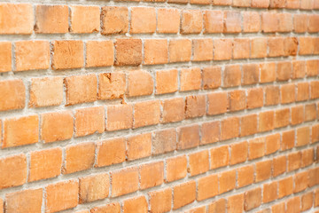 Grunge old red brick pattern textured background. (Focus at front)