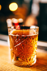 Whiskey with ice in cristal glass