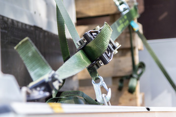 Cargo lashing material hangs on a truck load area