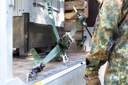 German army soldier lashed cargo with lashing material