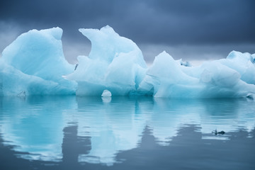 Icebergs in the Skaftafell National Park, Iceland. Ocean bay and icebergs. Reflection on the water surface. Landscapes in Iceland. Travel - image