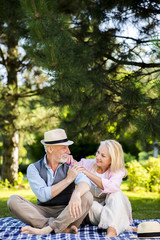 Old man looking at his woman
