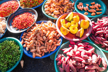 Fresh colourful fruits and vegetables in a wet market.