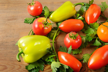 Vegetables on old wooden table. Flat lay, top view.