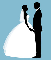 Silhouette of a loving couple of newlyweds groom and bride in full length in wedding dresses