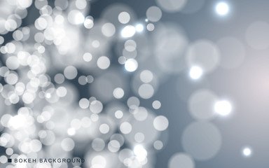Silver abstract bokeh background sparkling lights effect. Blured circle on gray background.