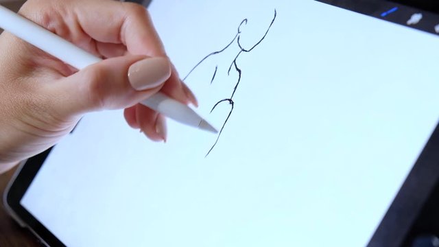 Young asian woman professional designer using graphic tablet
