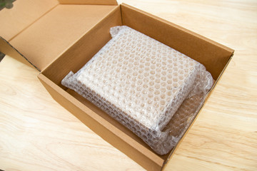 Bubbles covering the box by bubble wrap for protection product